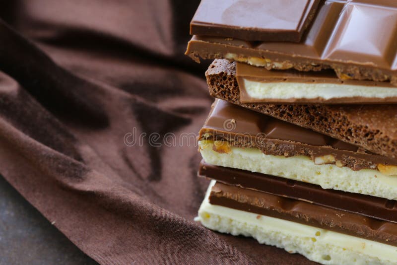 Verschillende chocoladerepen - wit, zwarte melk stock foto