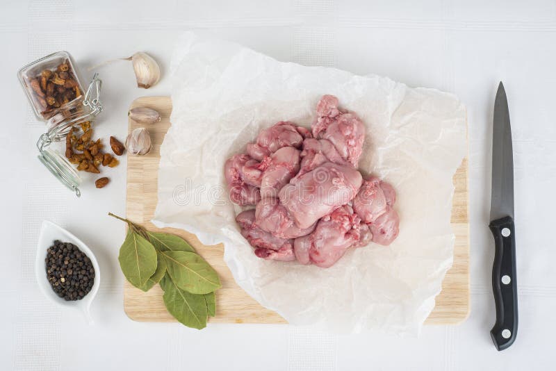 Fresh lamb sweetbreads and some ingredients to cook them. Fresh lamb sweetbreads and some ingredients to cook them