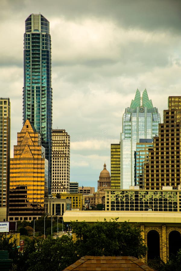 Vertical Austin Skyline Capitol Building of Texas with the office buildings , towers , and skyscrapers . The tallest building is the austonian and is a residential tower. The Frost bank tower and more