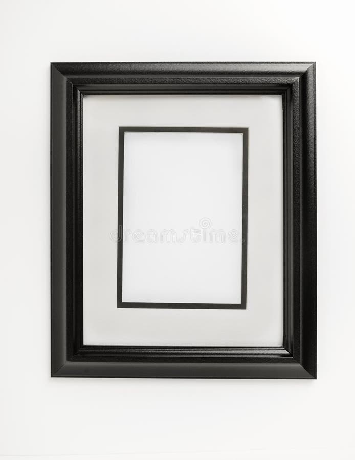 Vertical Black and White Picture Frame Mounted on the Wall Stock Image