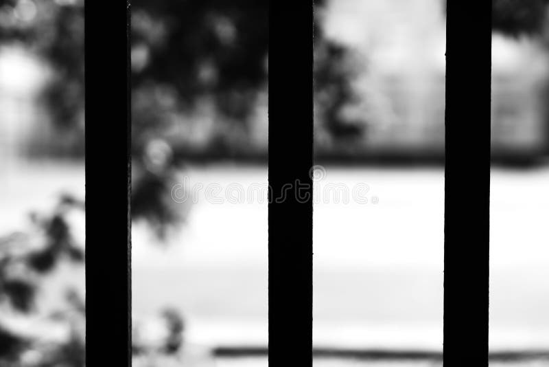 Vertical black and white prison cell bokeh background