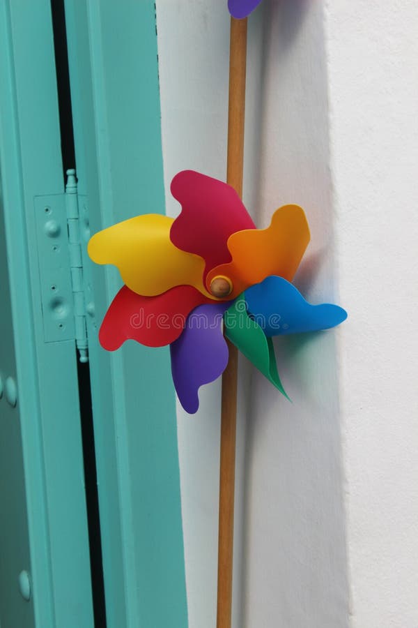 Vertical closeup shot of colorful pinwheels for children stock photo