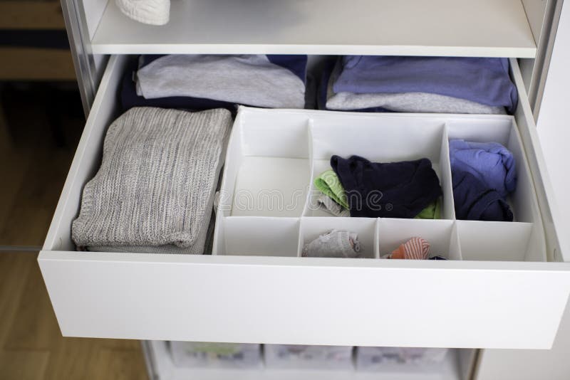Vertical Clothing Storage Ideas. Stock Photo Image of tidying, system