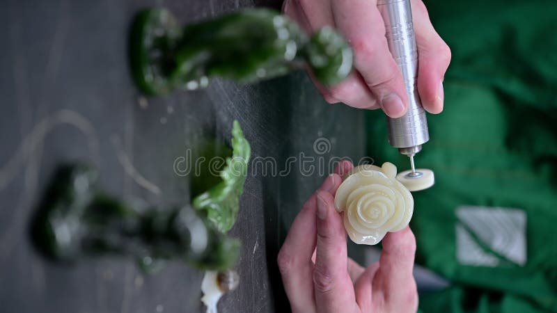 Vertical greenstone jewellery process making stock footage