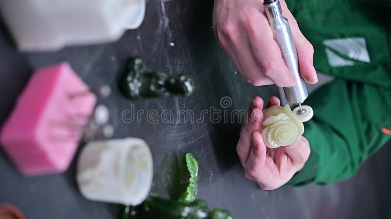 Vertical greenstone jewellery process making stock video