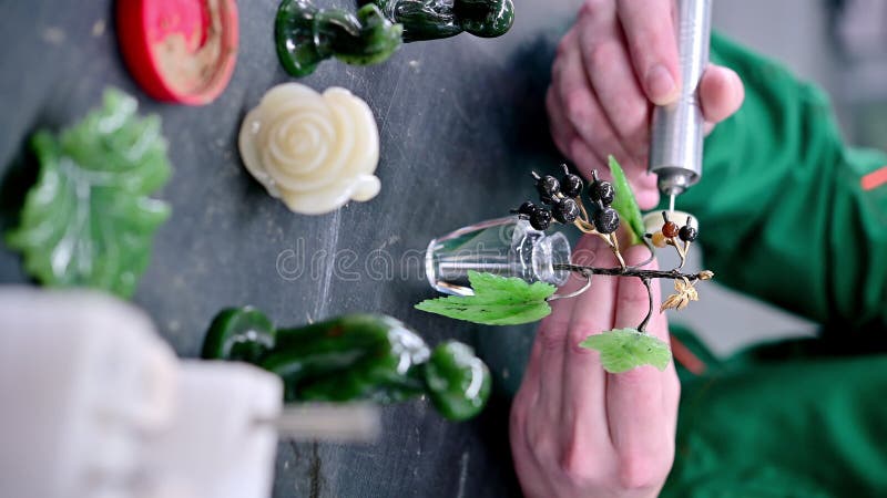 Vertical greenstone jewellery process making stock video footage
