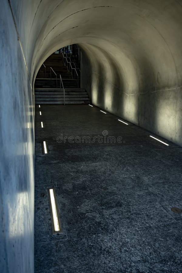 Vertical High Angle Shot of an Underground Pathway Decorated with White