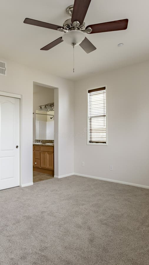 Vertical Master Bedroom with No Furniture Clean Inside Stock Image