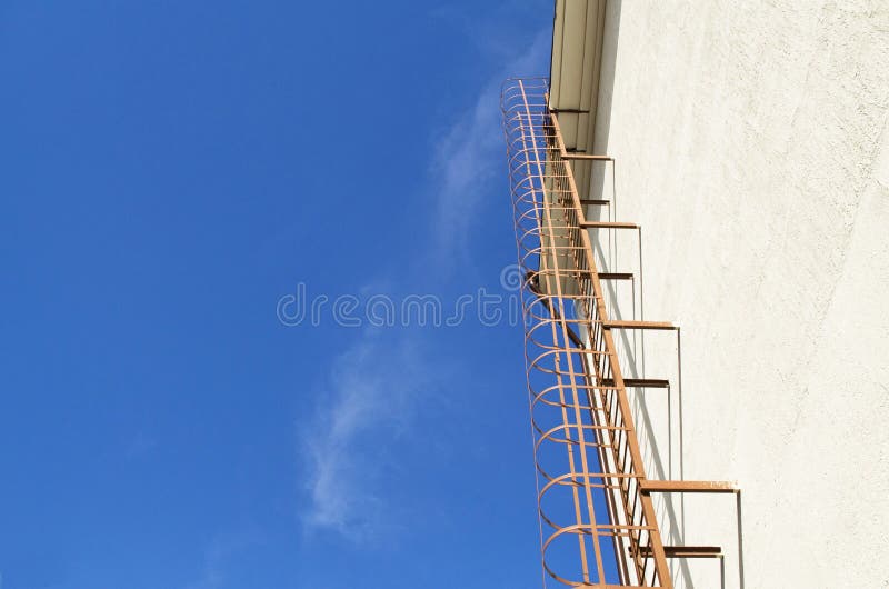 Vertical metal fire ladder stock image. Image of railings 59552747