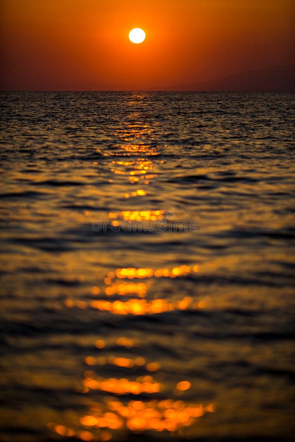 Vertical photo of a beautiful sunset. stock photo Vertical photo of a beautiful sunset. stock photo
