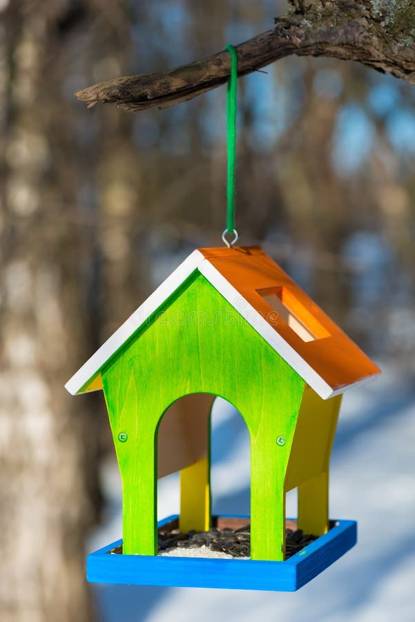 Vertical photograph bird feeders handcrafted