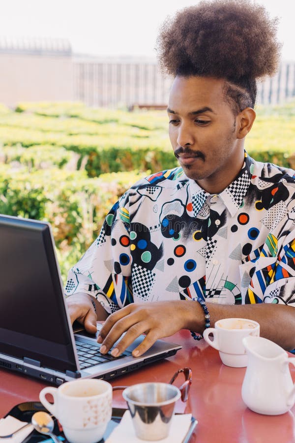 Vertical Picture of Black Guy with Afro Hair Pulled Back Working with a  Laptop Stock Image - Image of hairstyle, adult: 220362703