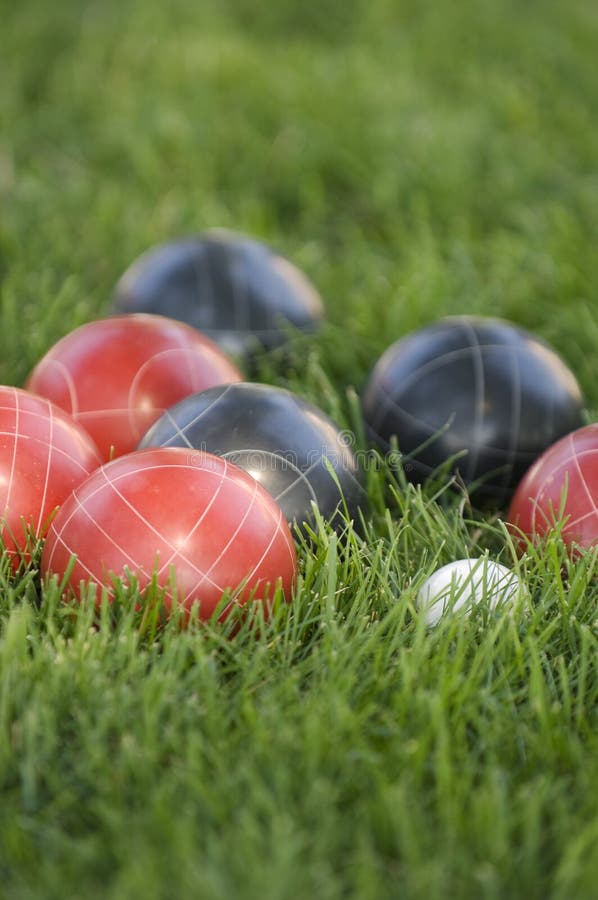 Vertical Picture Of Colourful Bocce Balls On The Lawn Under The