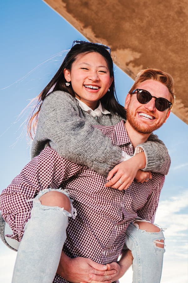 Man Giving Piggyback Ride To His Girlfriend Stock Photo - Image of  cheerful, person: 41022350