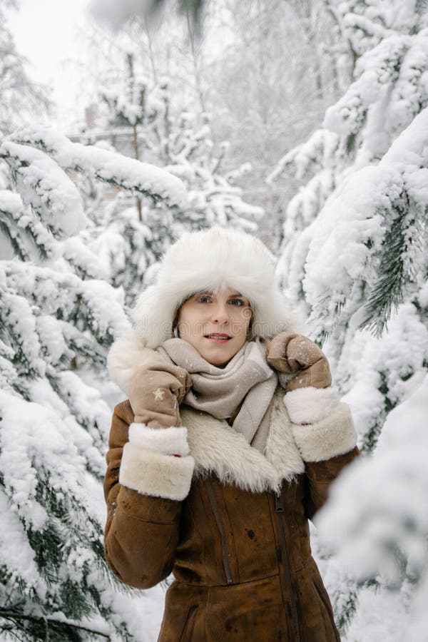 Vertical Portrait of a Smiling Young European Girl in a Sheepskin Coat ...