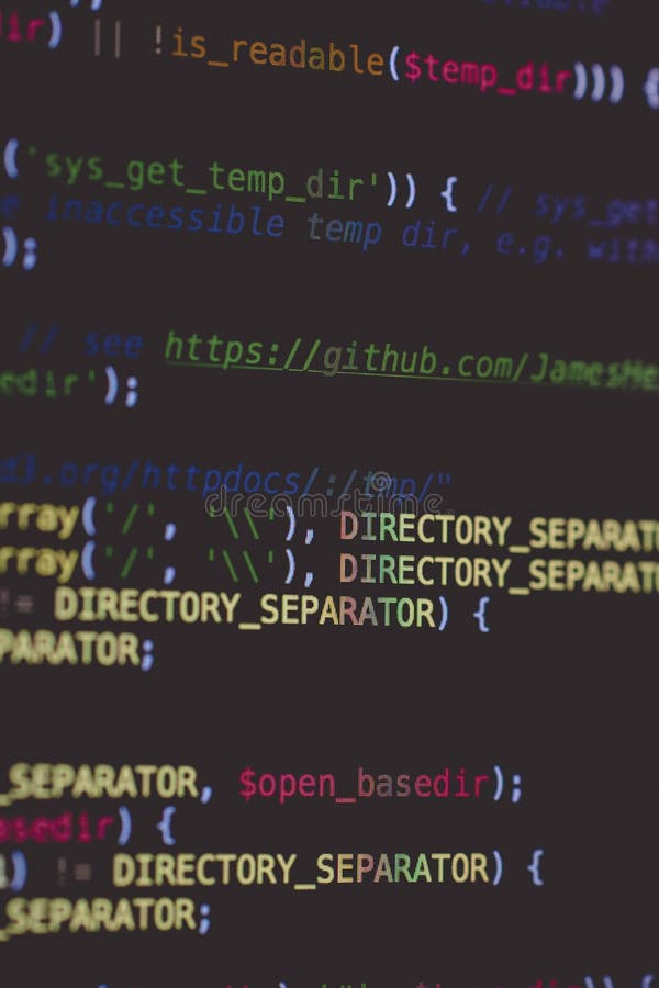 A vertical selective closeup shot of data codes on a black screen. Coding text hacker concept stock images, royalty-free photos and pictures