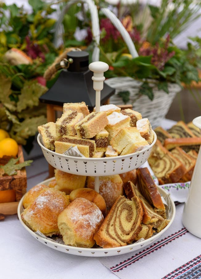 Vertical Selective Focus of a Twotiered Dessert Stand with Baked Goods