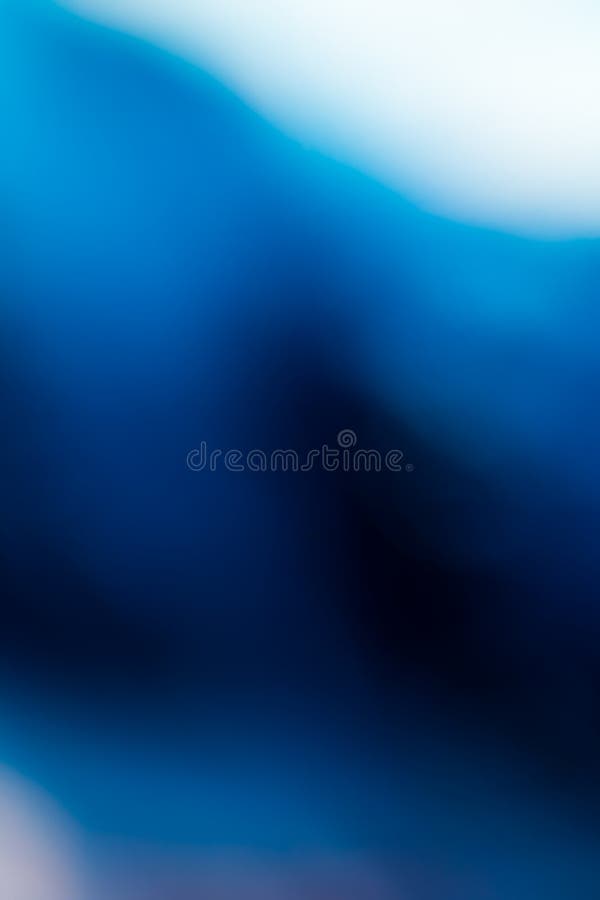 Vertical Shot of Dark Blue and White Wallpaper for Smartphones Stock