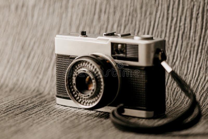 Vertical Shot of a Film Camera on a Textured Background Stock Photo Image of equipment, studio