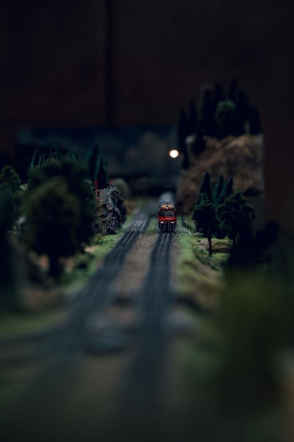 Vertical Shot of a Red Train Figure on Play Tracks Stock Image Image