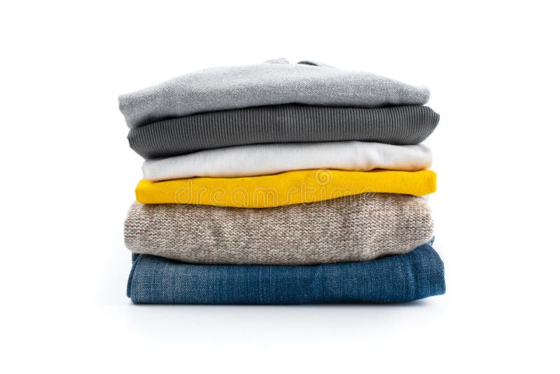 Vertical shot of a stack of folded clothes. stock photography