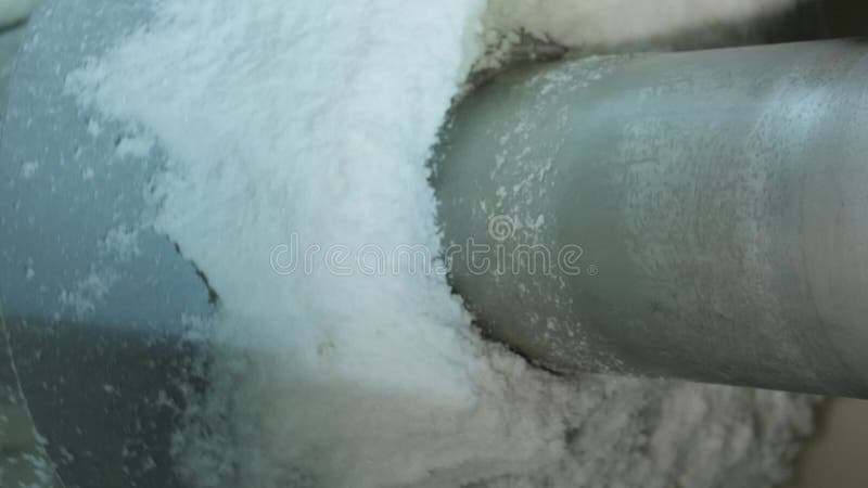 Vertical video. Batch centrifuge for sugar production. Loading of sugar stock video footage