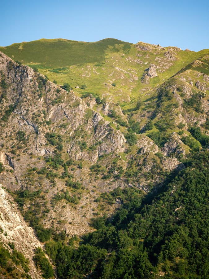 Vertical view of section of the Apuan Alps, Alpi Apuane, near the Vestito Mountain Pass. Massa Carrara, Italy, Europe stock photo Vertical view of section of the Apuan Alps, Alpi Apuane, near the Vestito Mountain Pass. Massa Carrara, Italy, Europe stock photo