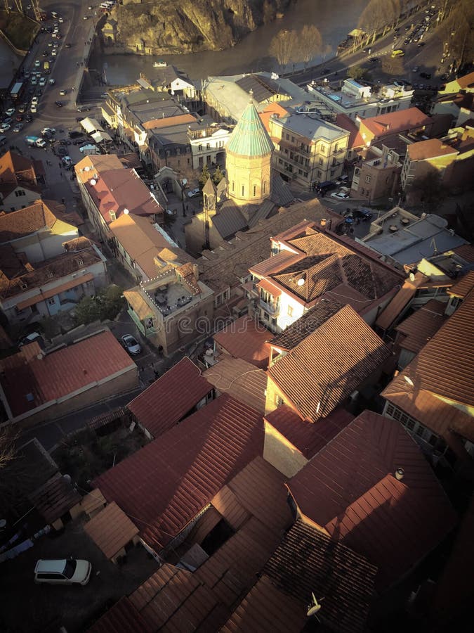 Vertical view from the top from a height of a beautiful tourist city with buildings and houses, roofs of trees and plants, nature royalty free stock photography Vertical view from the top from a height of a beautiful tourist city with buildings and houses, roofs of trees and plants, nature royalty free stock photography