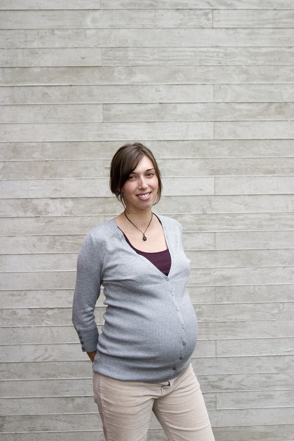 Verticale de femme enceinte images stock Verticale de femme enceinte images stock