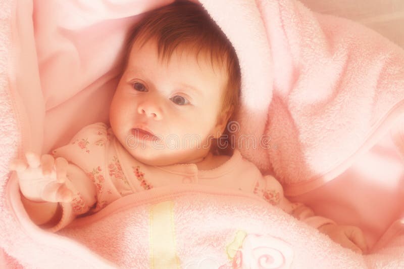 Sentimental portrait of little baby in pink colored. Sentimental portrait of little baby in pink colored