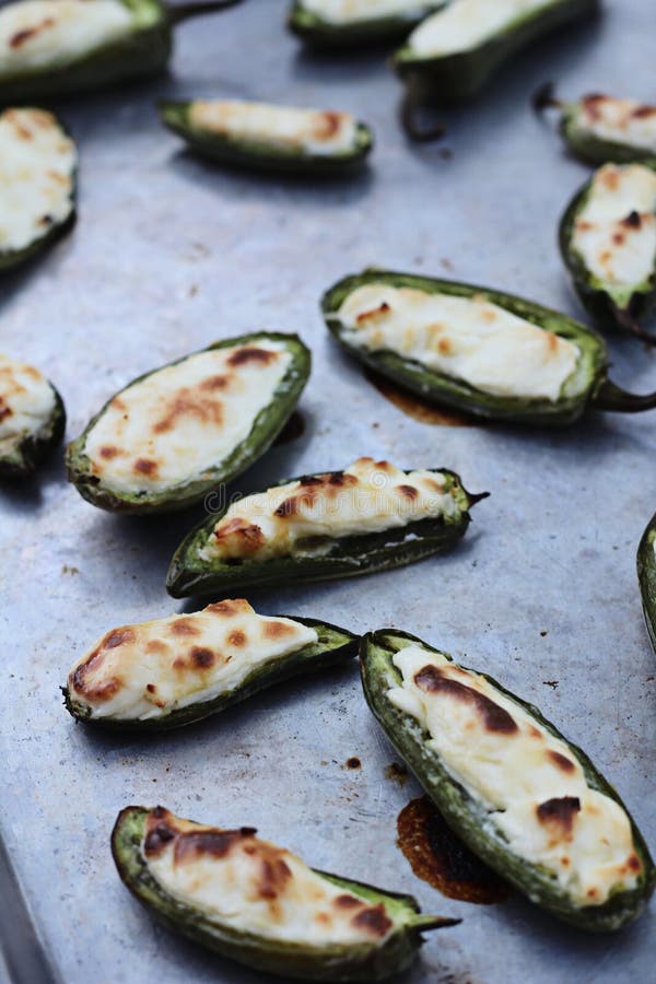 Shot of jalapeno stuffed and baked vertical. Shot of jalapeno stuffed and baked vertical