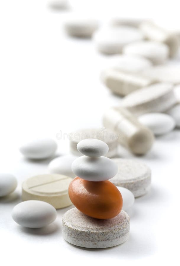 Balanced pills isolated on white. Balanced pills isolated on white