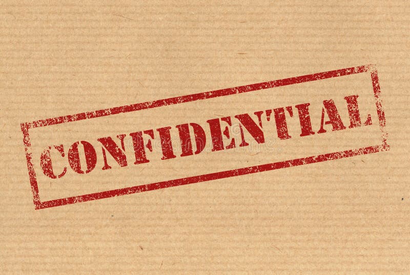 Confidential red rubber ink stamp on karft paper texture. Confidential red rubber ink stamp on karft paper texture