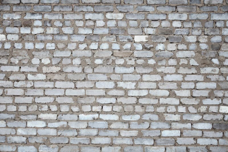 Verwitterte Backsteinmauer, absyarct Hintergrund lizenzfreie stockfotos