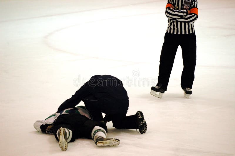 Verwonde hockeyspeler stock foto's Verwonde hockeyspeler stock foto's
