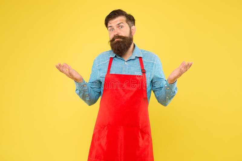 Verworrene männliche Reinigungskraft. Kleinbetriebladenbesitzer. reifer Verkäufer. Berufschef im Roten Platz vor. Restaurant lizenzfreies stockbild
