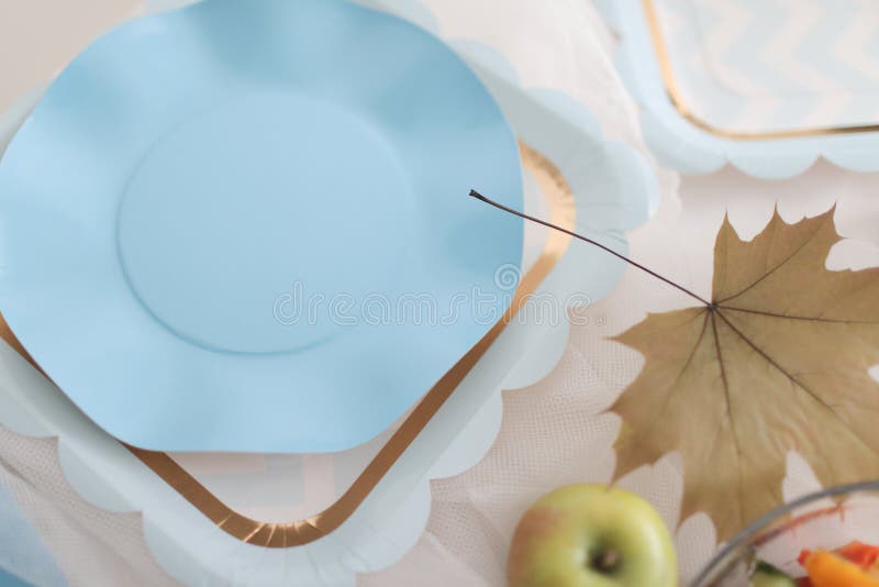 Very Beautiful Holiday Disposable Tableware in Blue. Stock Photo