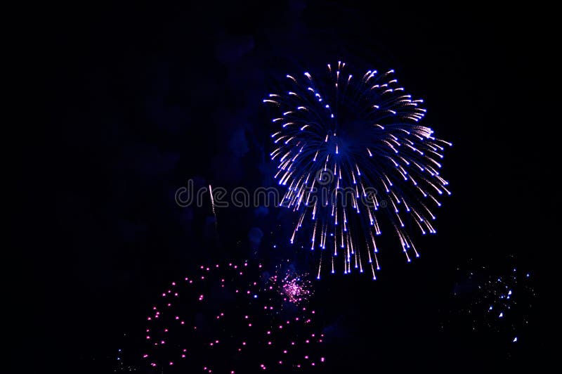 Very cheap firework over the city, purple stock photo Very cheap firework over the city, purple stock photo