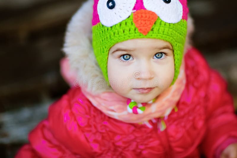 Very Cute Girl in a Red Jacket and Hat with Owl Stock Image Image of