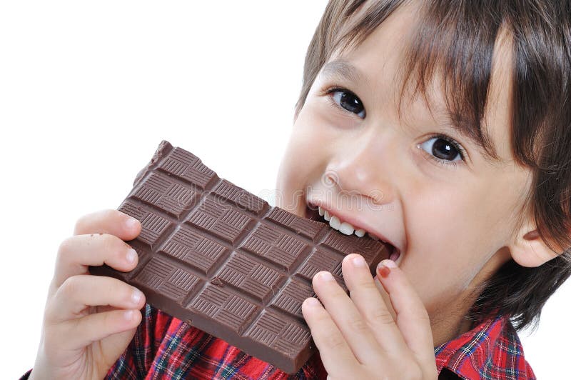 Very cute kid with chocolate