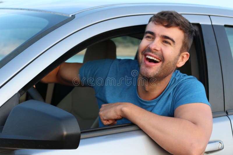 Very cute male driver smiling royalty free stock photography