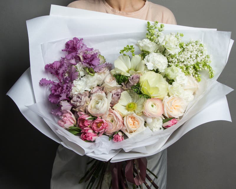 A Large Lush Bouquet of Red Garden Roses and Buds in Black