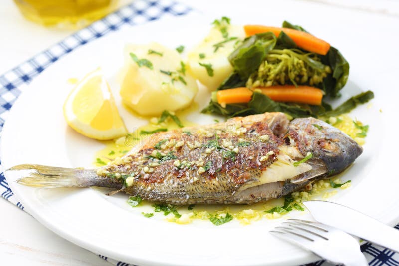 Very fresh seabream fish grilled with turnip greens