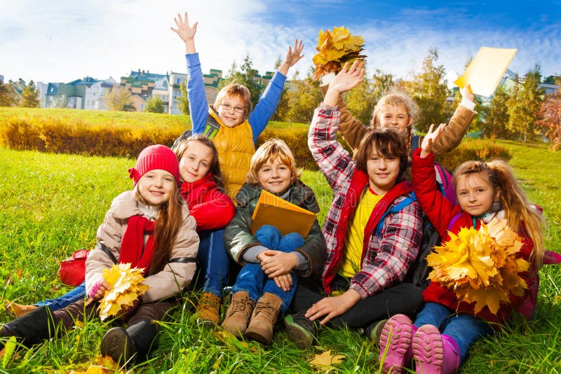 Very happy kids on the lawn