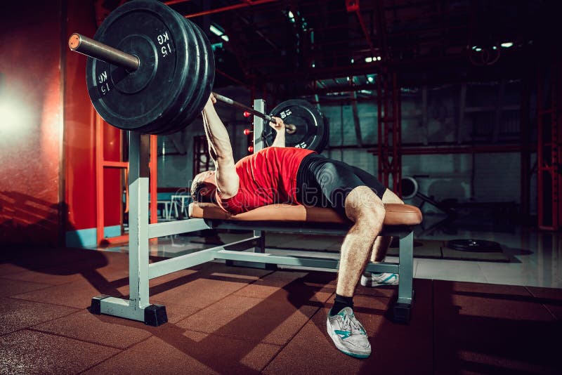 Man Doing Bench Press Workout in Gym Stock Photo - Image of metal,  gymnastics: 107836568