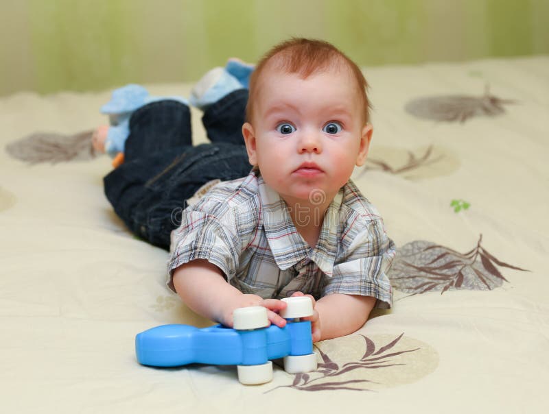 Very Surprised Baby Boy Lying Bed Stock Photos Free And Royalty Free