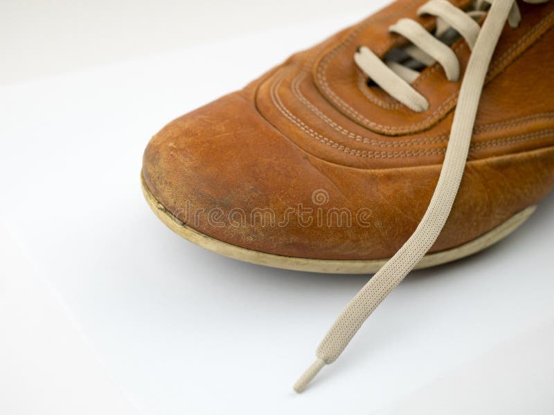 very worn old leather dress shoes. men&#x27;s leather shoes placed. isolated on white