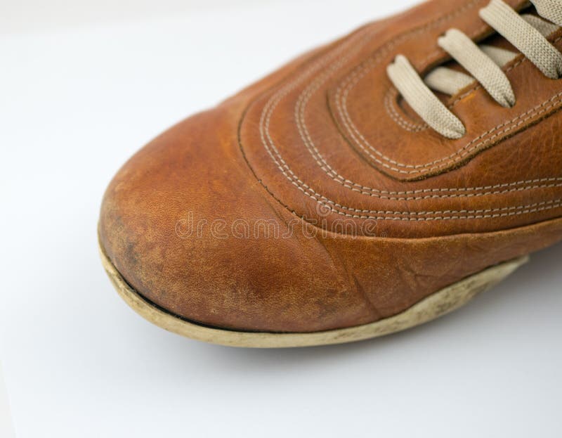 very worn old leather dress shoes. men&#x27;s leather shoes placed. isolated on white