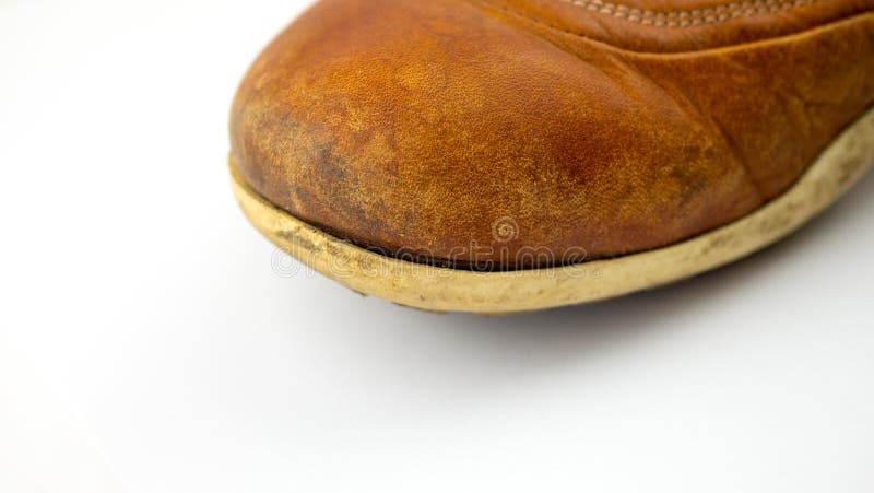 very worn old leather dress shoes. men&#x27;s leather shoes placed. isolated on white