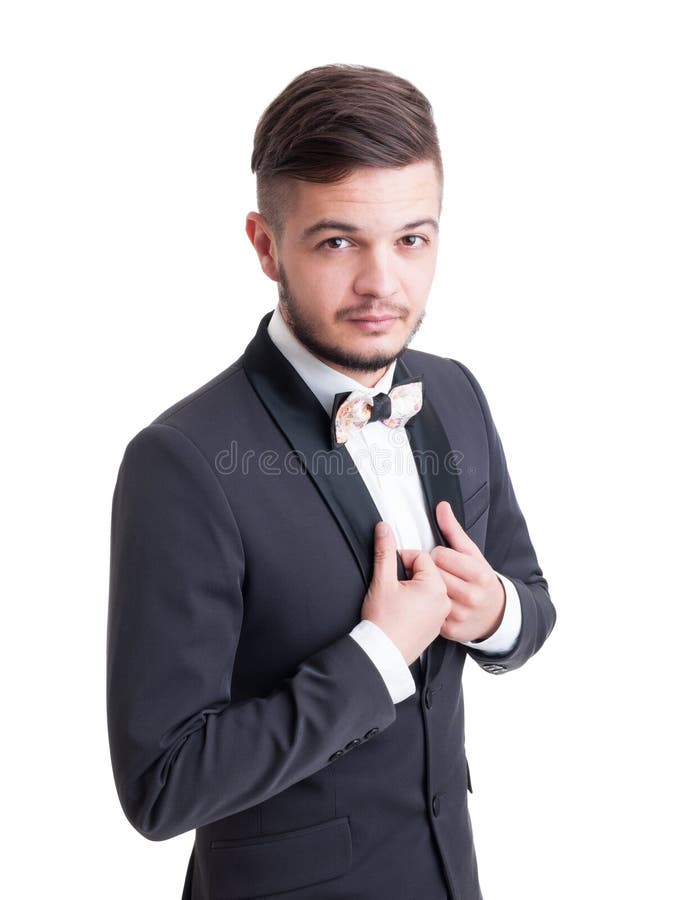 Veste de port modèle masculine belle de smoking et noeud papillon coloré image libre de droits Veste de port modèle masculine belle de smoking et noeud papillon coloré image libre de droits